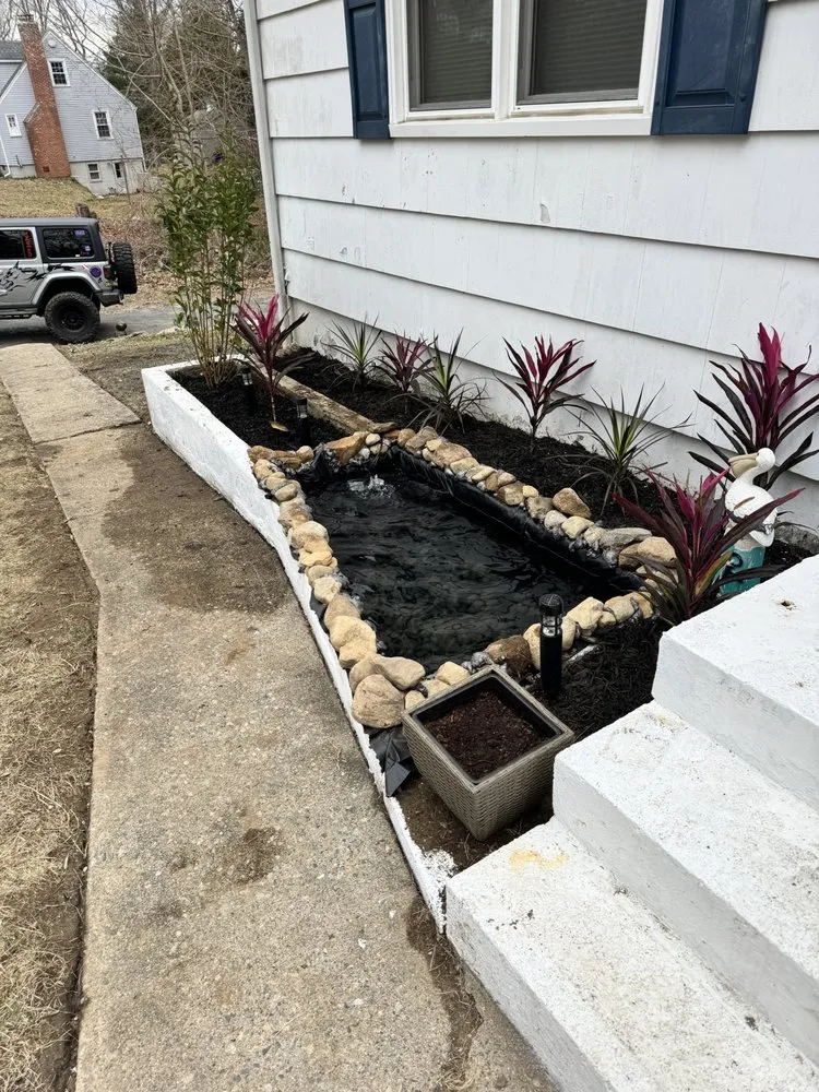 Custom yard maintenance for beautiful yards in Mystic, CT by D&M Outdoor Services