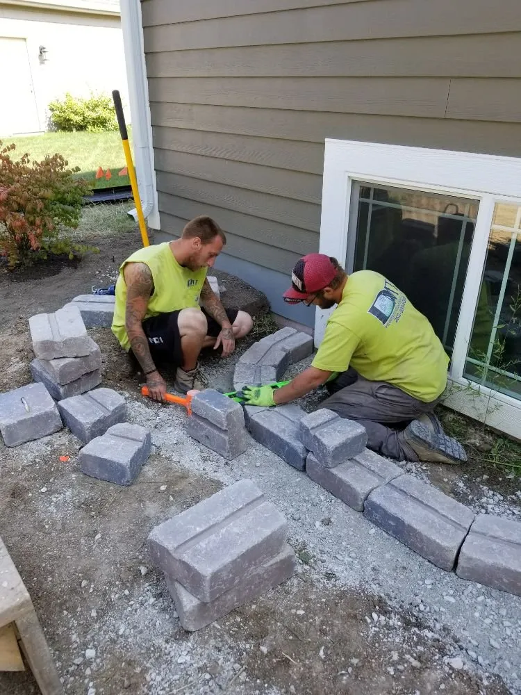 Affordable lawn mowing service for homes in Sturtevant, WI by DMT Contractors