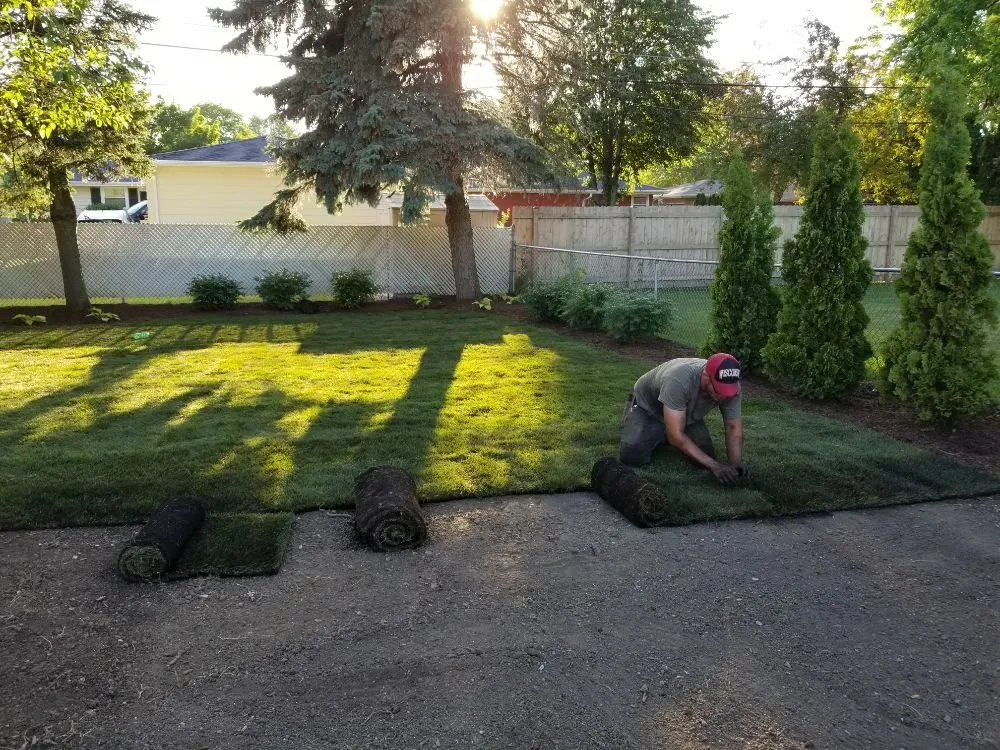 Custom lawn mowing service for residential properties in Sturtevant, WI by DMT Contractors