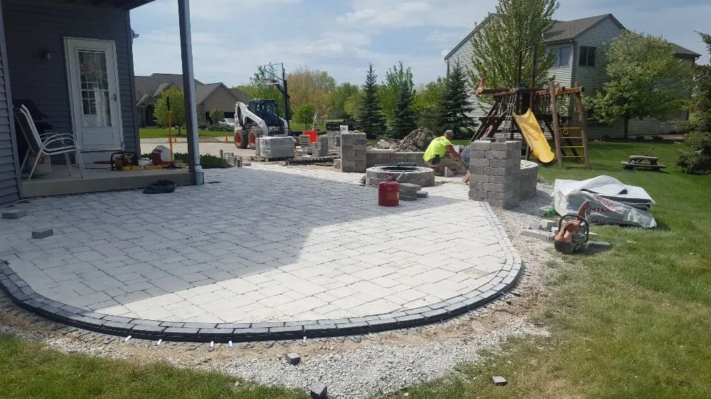 Expert landscape design for residential properties in Sturtevant, WI by DMT Contractors