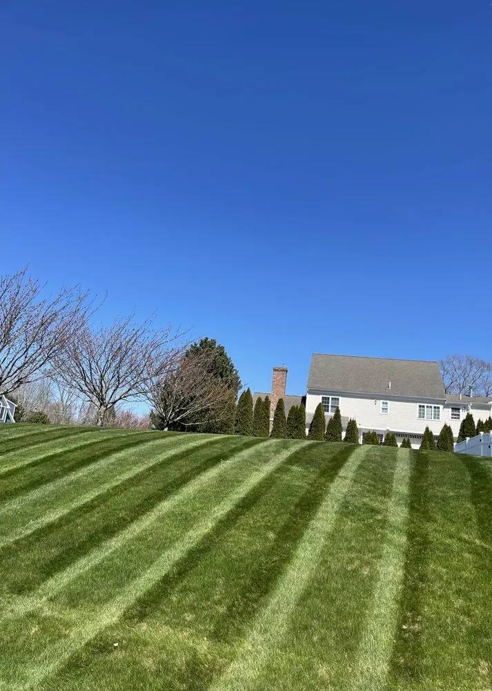 Trusted lawn mowing service for residential properties across Hanover, MA - DMX Landscaping