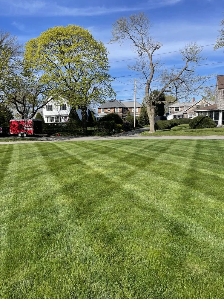 Professional yard cleanup service for outdoor upgrades in Hanover, MA by DMX Landscaping