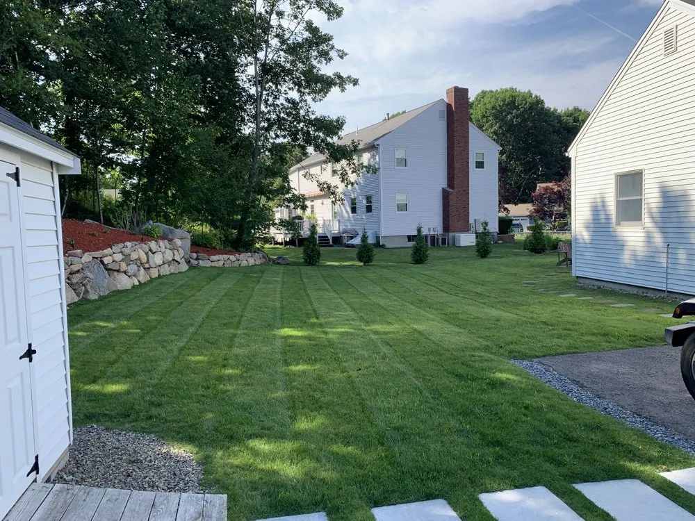 Professional outdoor landscaping for year-round maintenance across Hanover, MA - DMX Landscaping