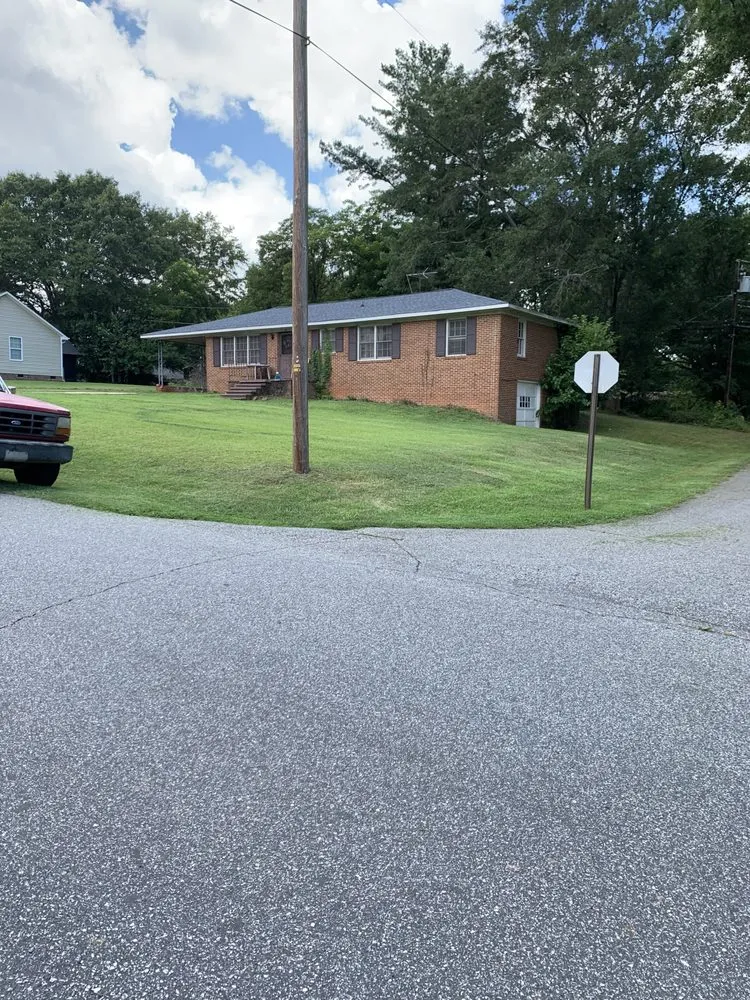 Custom lawn mowing service for residential properties in Greer, SC by DNC Landscaping Pressure Washing