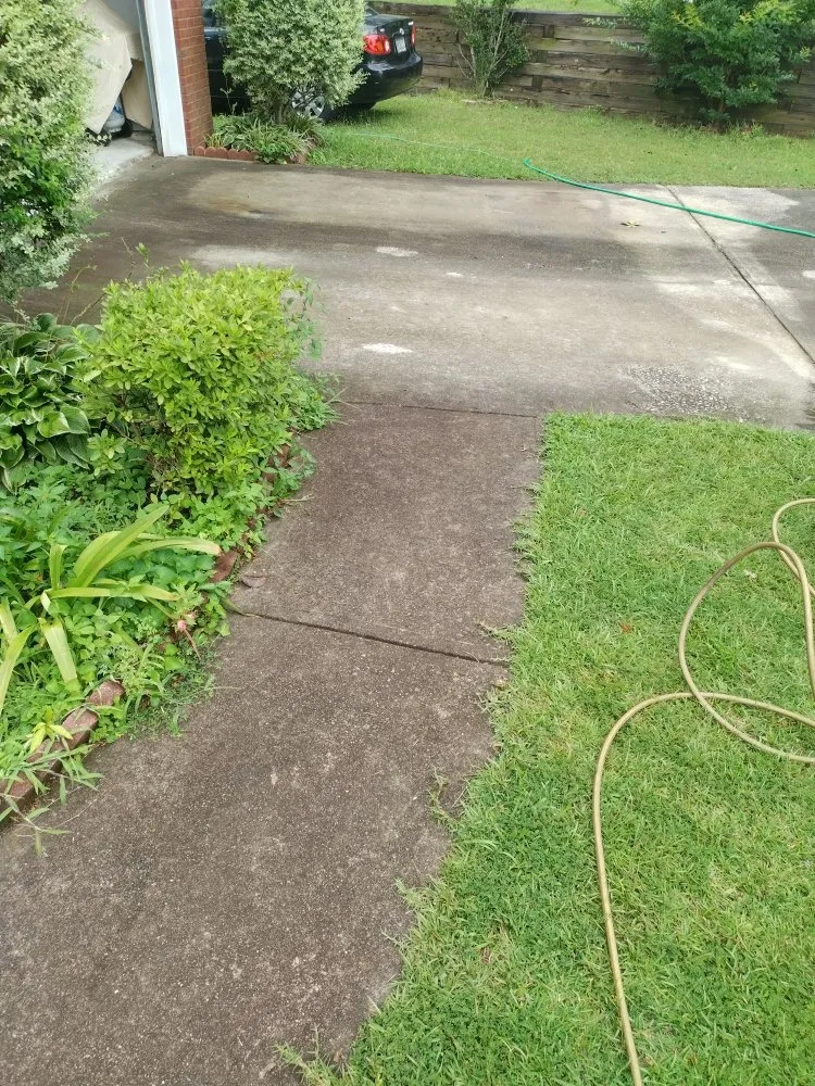 Expert lawn mowing service for year-round maintenance in Madison, MS by Do It All Construction and Landscaping