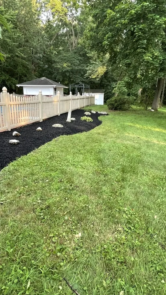 Trusted lawn care service for year-round maintenance in Troy, NY by Dobert’s landscaping
