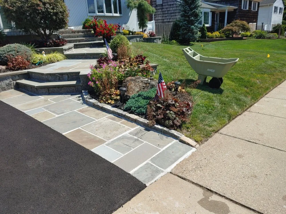 Reliable yard maintenance for beautiful yards in Central Islip, NY by Doctor Green Landscaping