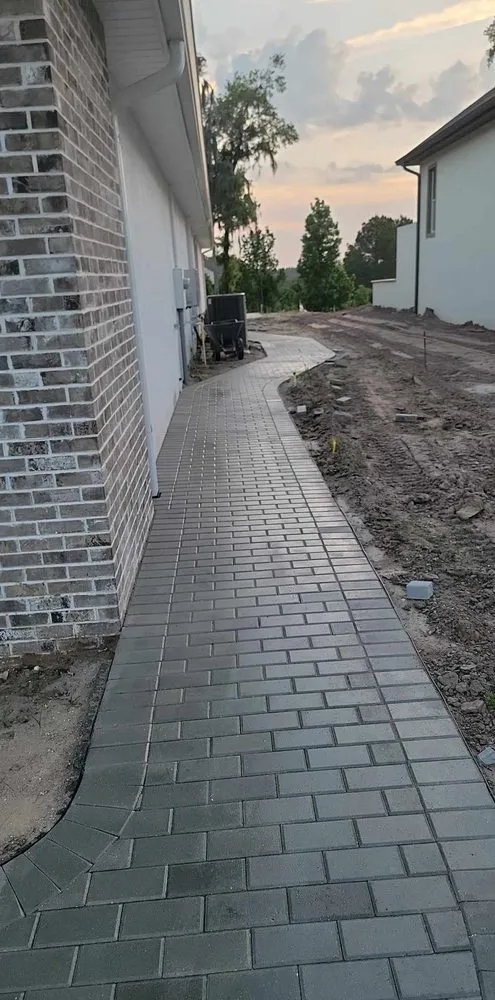 Professional yard maintenance with custom design across Brooksville, FL - Dodges Pavers Concrete N More