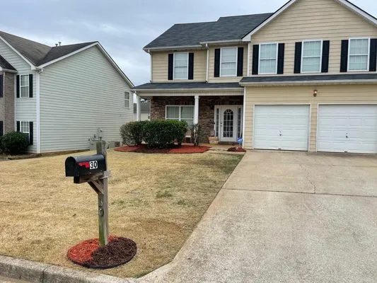 Doing it Big Lawn Care Logo