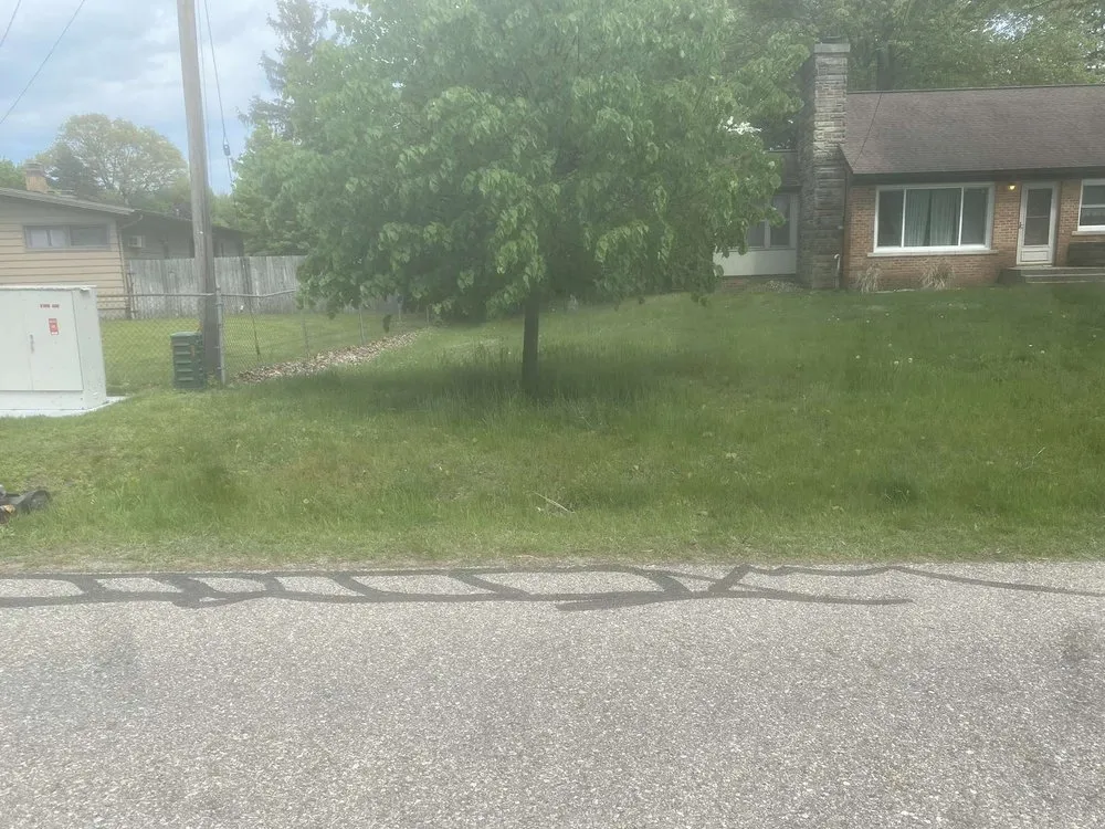 Reliable lawn mowing service for residential properties in Muskegon, MI by Dom N Gavin Lawn Service