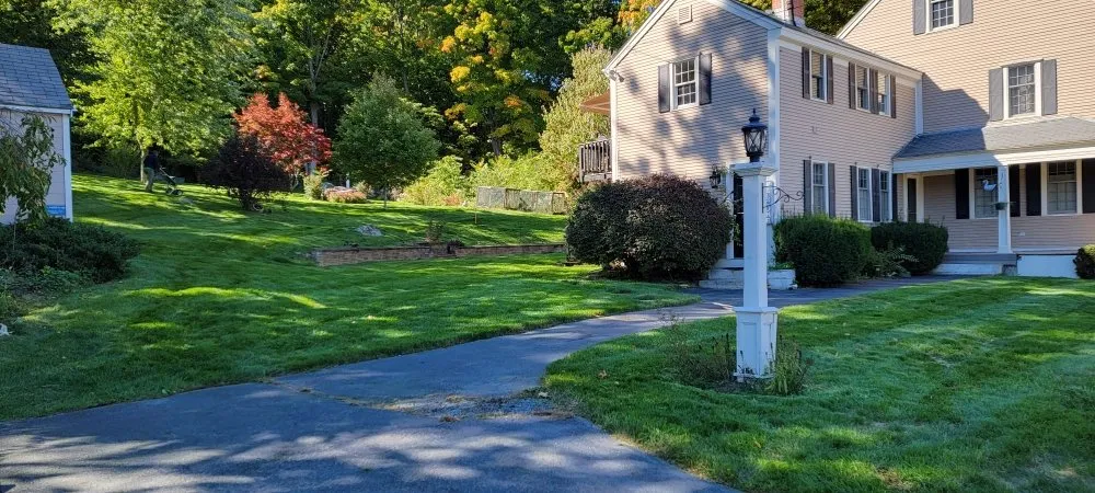 Reliable yard maintenance for residential properties in Dracut, MA by Domark landscaping