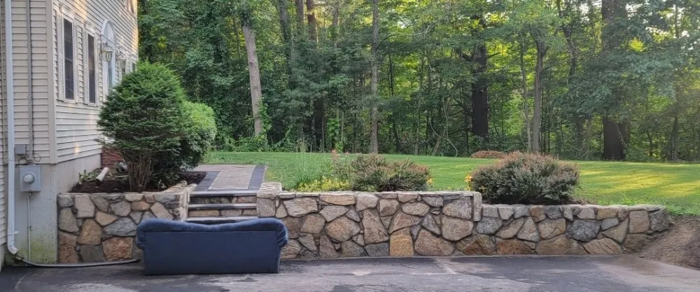 Local yard cleanup service near you in Dracut, MA by Domark landscaping