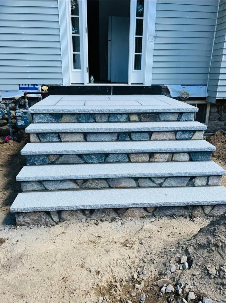 Local garden landscaping for year-round maintenance in Dracut, MA by Domark landscaping