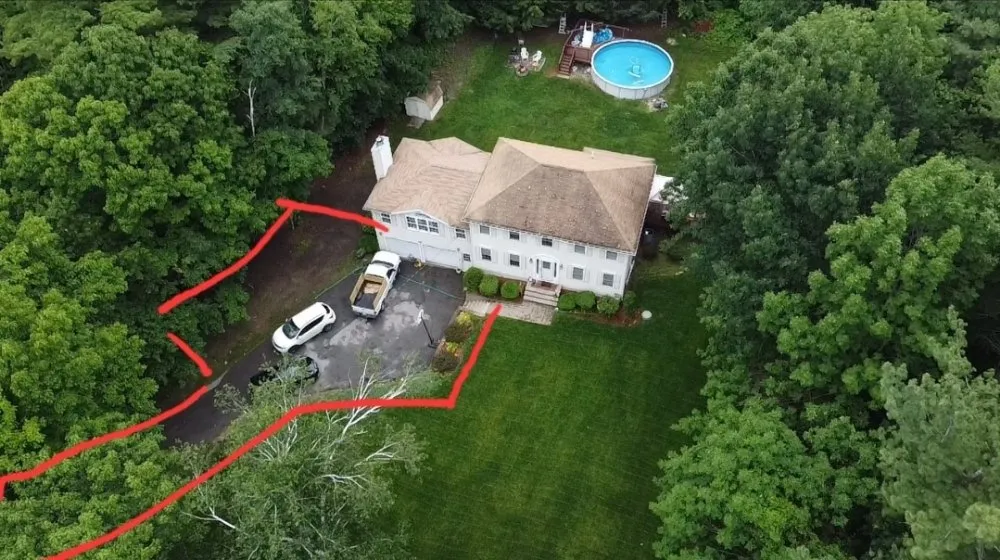 Affordable outdoor landscaping with custom design in Dracut, MA by Domark landscaping