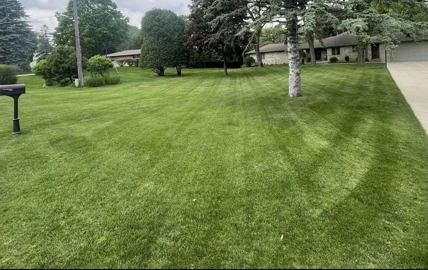 Custom garden landscaping in Rochester, MN by DomBons Mowing and Services