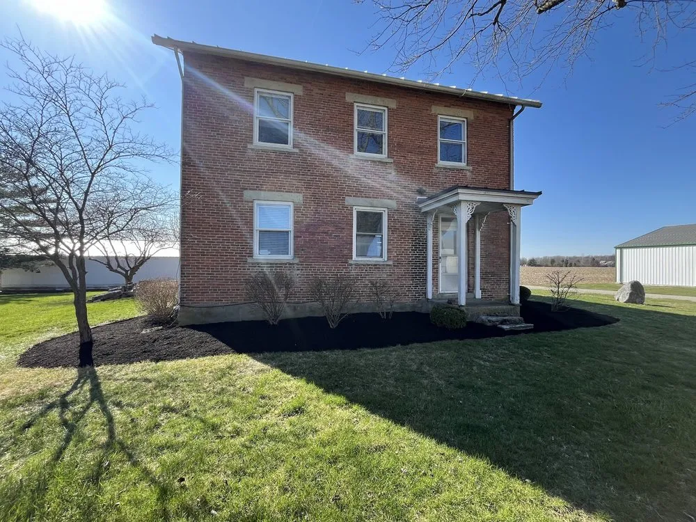 Custom garden landscaping for residential properties in Englewood, OH by Dominion Lawn and Landscaping