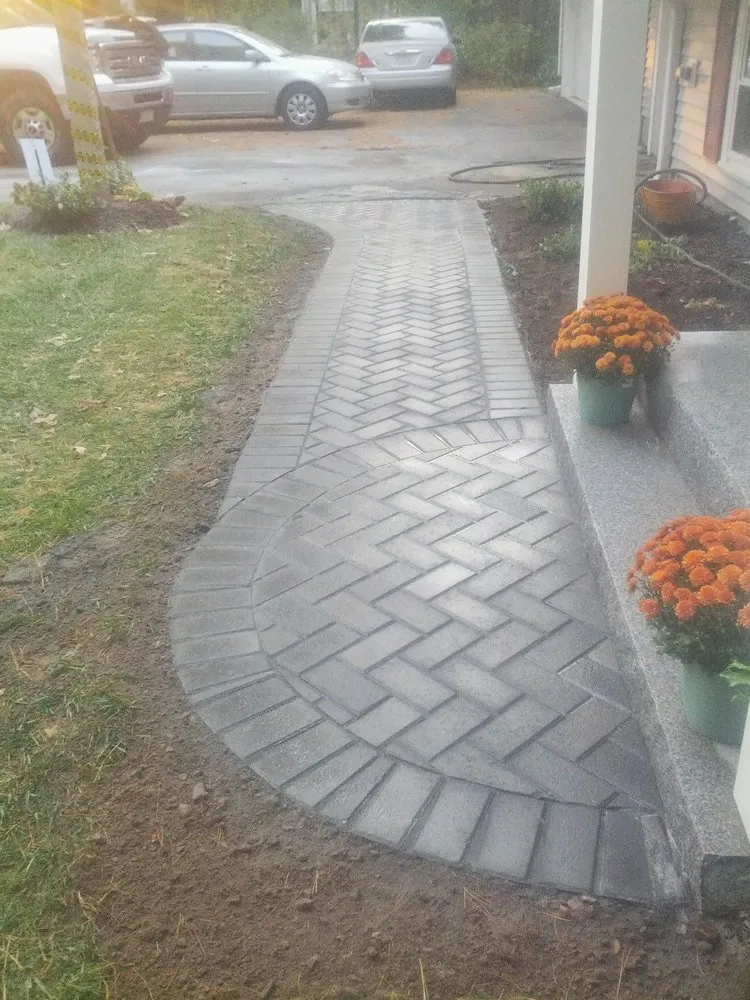 Professional lawn mowing service with custom design in Marshfield, MA by Don Regan Masonry