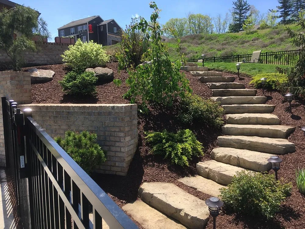 Custom landscape installation in Finleyville, PA by Donas Outdoor Living