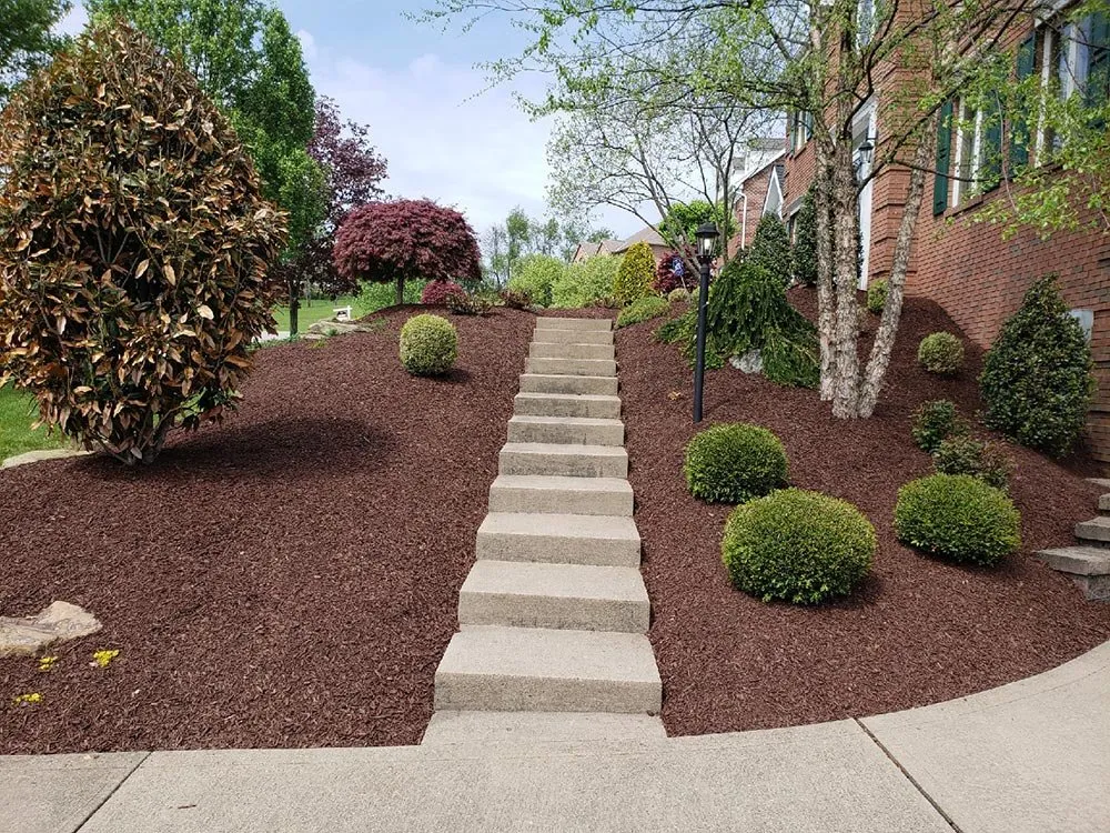 Custom residential landscaping for beautiful yards in Finleyville, PA by Donas Outdoor Living