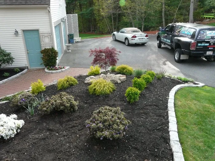 Local yard maintenance with custom design in Newton, MA by Done Right Landscape