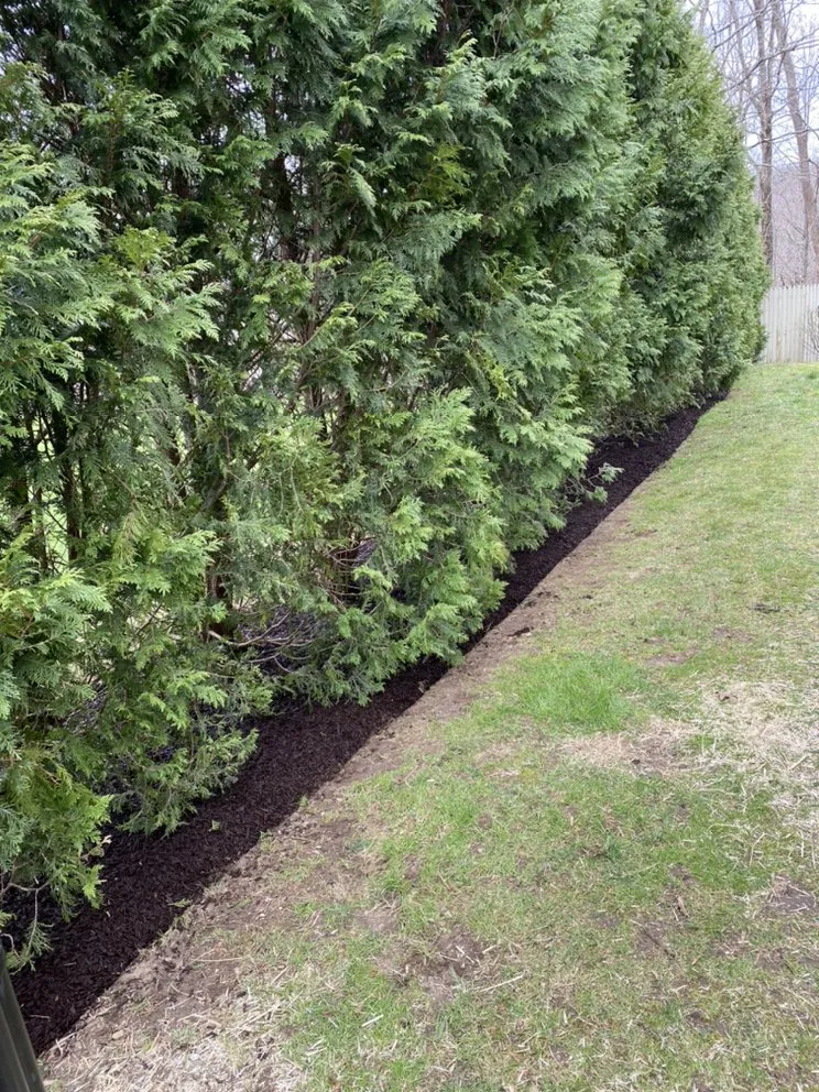 Local lawn mowing service with custom design in Bedford, NY by Donis Landscaping