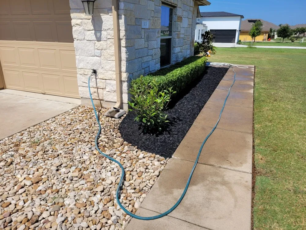 Custom yard maintenance for year-round maintenance in Elgin, TX by Dosbros Landscaping