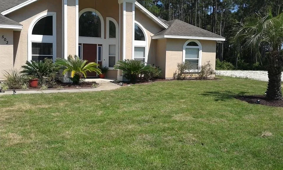 Expert landscape design for homes in Panama City, FL by Doster’s