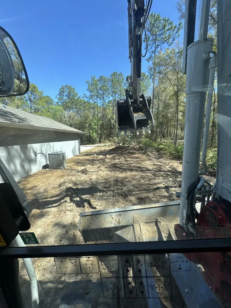 Trusted lawn care service for residential properties in Inglis, FL by Double D Land & Tree