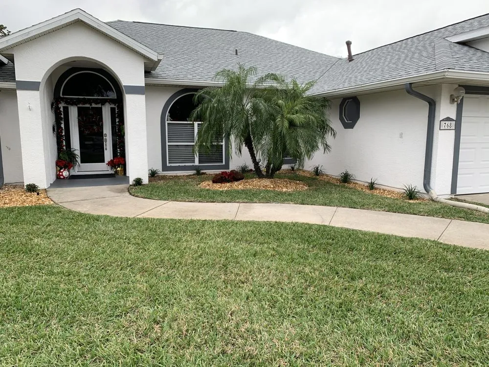 Reliable outdoor landscaping for residential properties in Palm Bay, FL by Doug Scott Lawn Maintenance