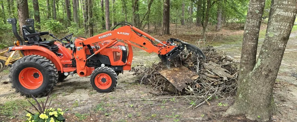 Expert outdoor landscaping for outdoor upgrades across Lugoff, SC - Doug's Lawn Tractor & Hauling Services