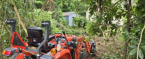 Doug's Lawn Tractor & Hauling Services Logo
