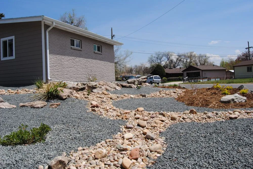 Custom outdoor landscaping with custom design in Wheat Ridge, CO by Down To Earth Designs