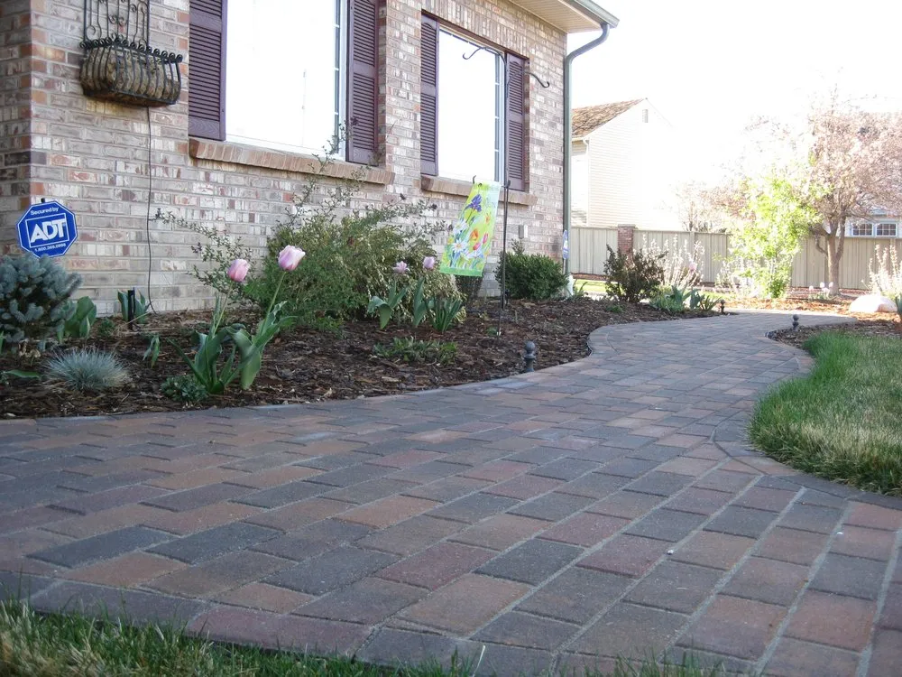 Custom lawn care service with custom design in Wheat Ridge, CO by Down To Earth Designs