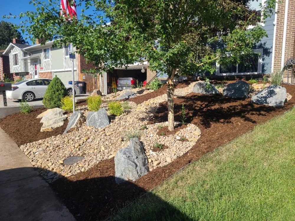Custom lawn care service for beautiful yards across Wheat Ridge, CO - Down To Earth Designs