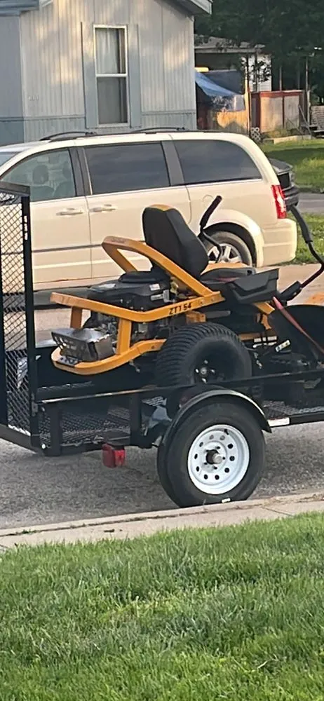 Reliable lawn mowing service for residential properties in Kansas City, MO by Down to earth lawn service