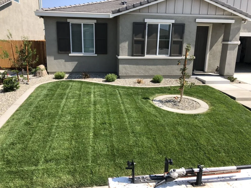 Affordable lawn mowing service with custom design across Modesto, CA - Down To Earth Outdoor Aesthetics