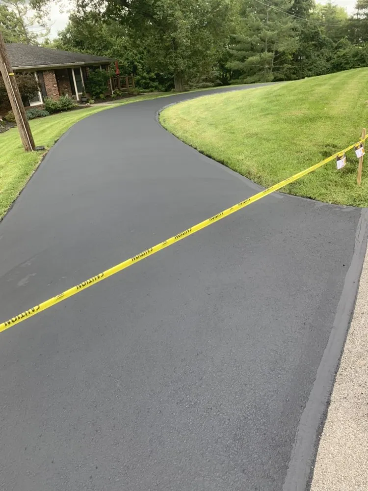 Custom outdoor landscaping with custom design across Louisville, KY - Down to Earth Seal Coating