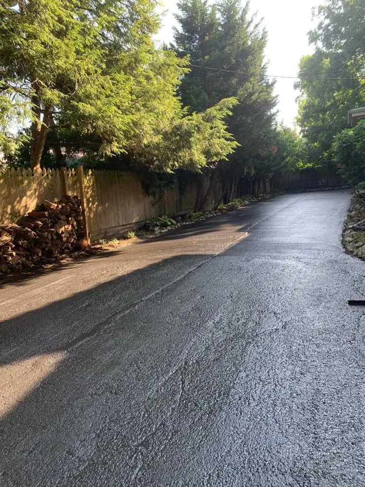 Top-rated lawn care service for year-round maintenance in Louisville, KY by Down to Earth Seal Coating