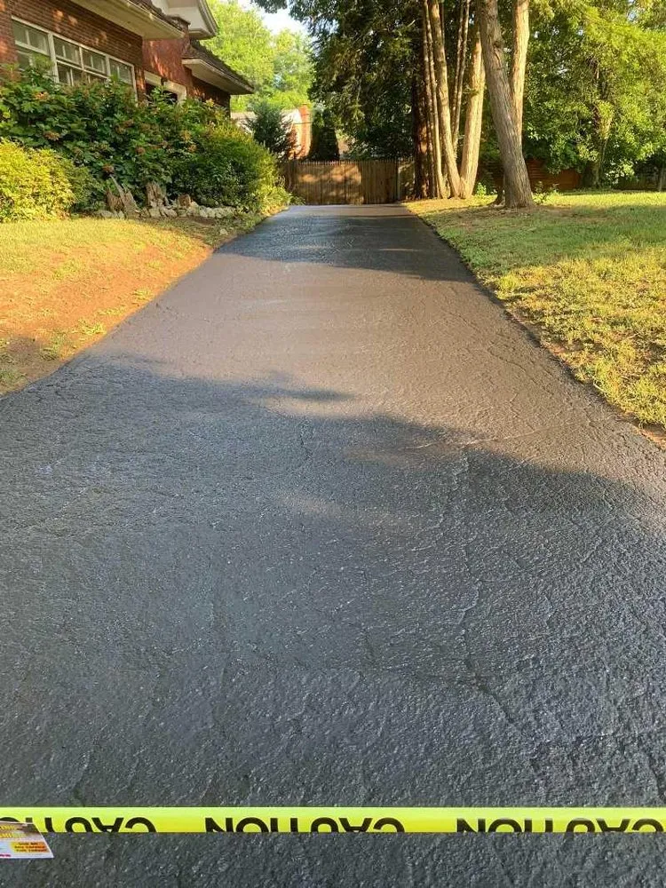 Expert lawn mowing service in Louisville, KY by Down to Earth Seal Coating