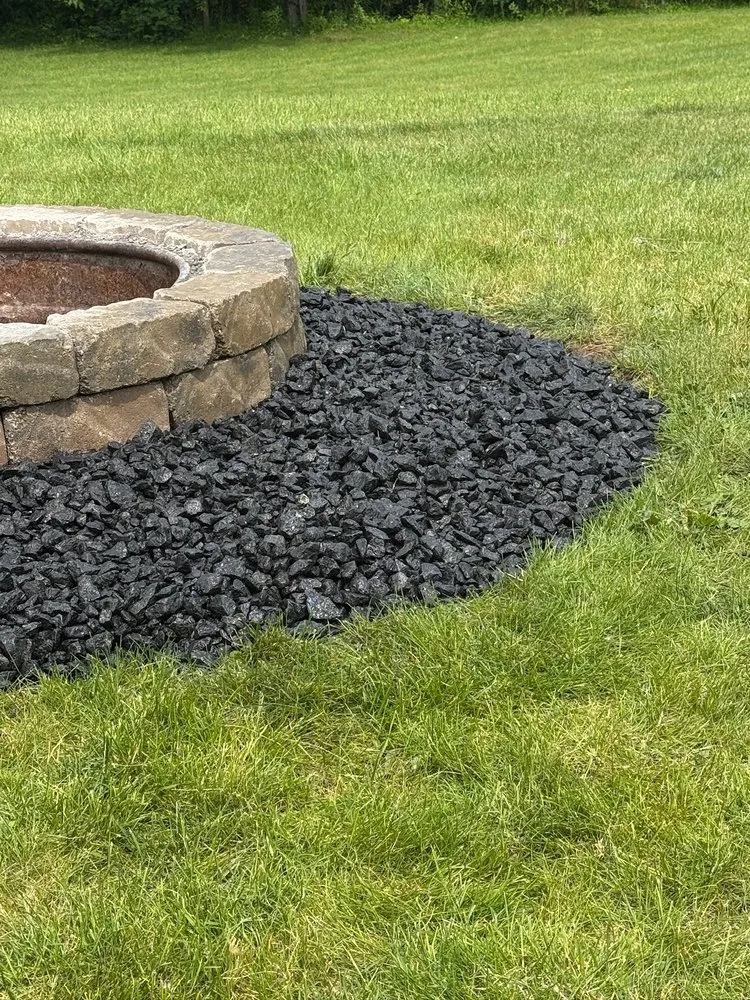 Affordable outdoor landscaping for residential properties in Clinton, MI by Down To Earth Services