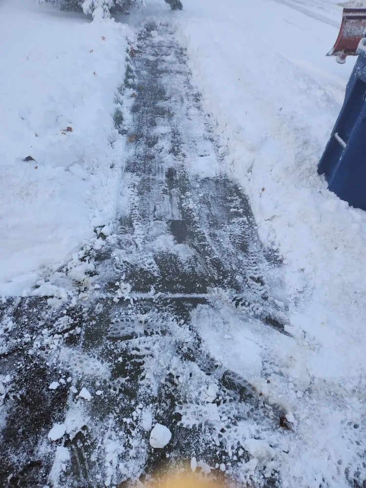 Custom lawn mowing service for homes across Buffalo, NY - Down To Earth snow removal & Landscaping