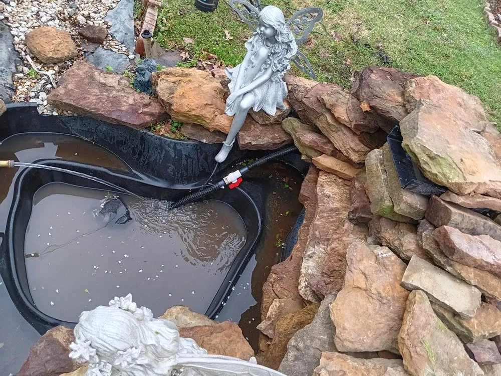 Custom landscape design with custom design in Pryor, OK by Downings Landscaping & Drains