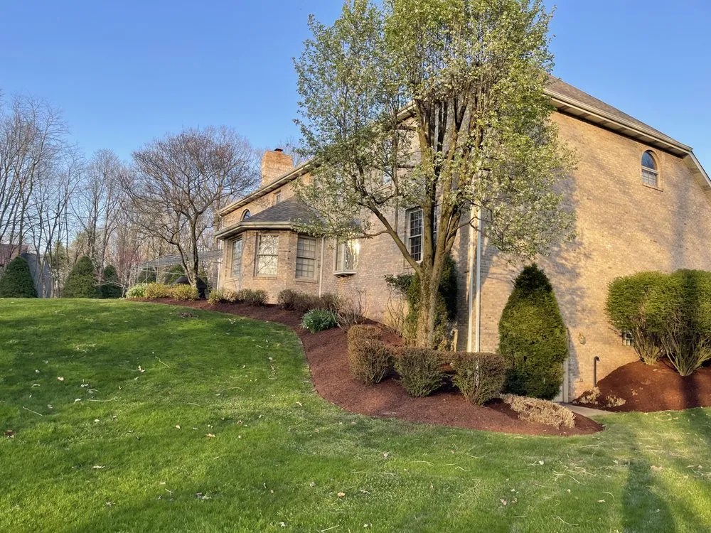 Expert lawn mowing service for homes in Monroeville, PA by Doyle Bros Lawn Care