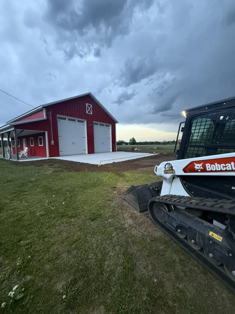 Custom outdoor landscaping experts serving McBain, MI - Dozie’s Dirtworks