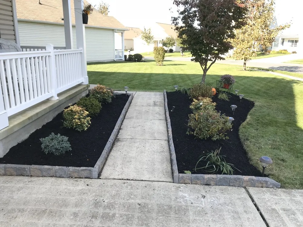 Custom lawn mowing service with custom design in Hammonton, NJ by D.P.A Lawns & Landscaping LLC.