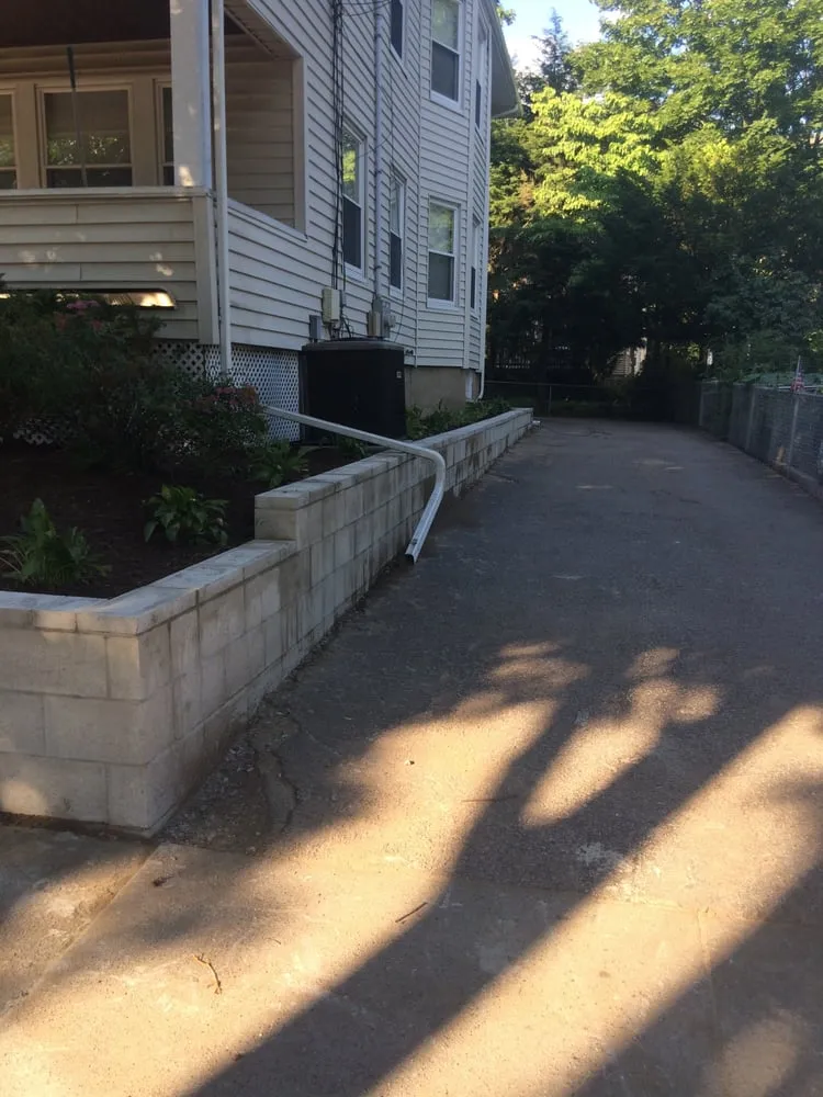Affordable yard cleanup service in West Roxbury, MA by Dr GreenThumb Landscaping