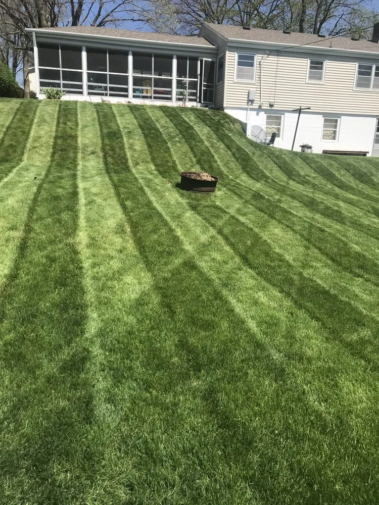 Expert landscaping services with custom design in Casey, IA by DR Lawn Service