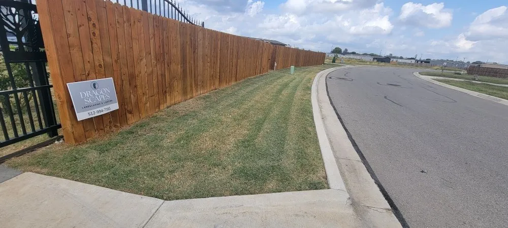 Affordable yard maintenance for residential properties in Bastrop, TX by Dragon Scapes