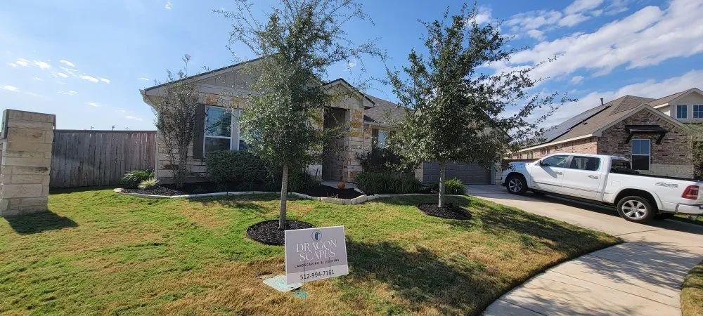 Affordable lawn care service in Bastrop, TX by Dragon Scapes