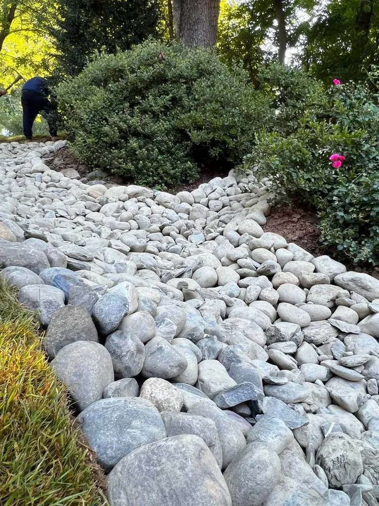 Affordable lawn mowing service with custom design across Falls Church, VA - Drainage & Erosion Solutions